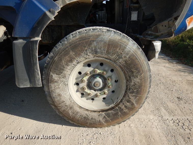 image for item JQ9312 2002 Volvo VHD  ready mix truck