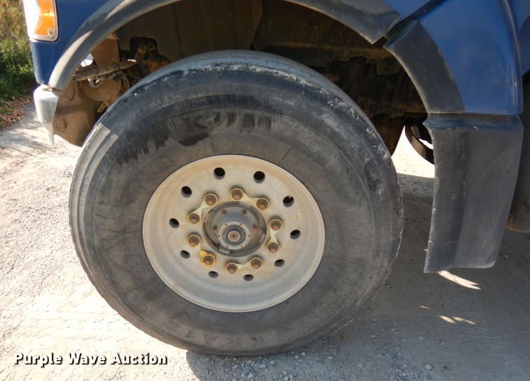 image for item JQ9312 2002 Volvo VHD  ready mix truck