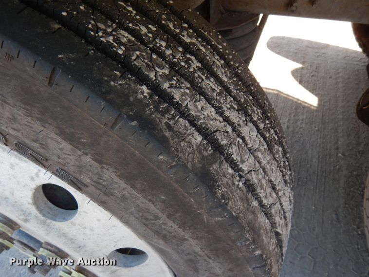 image for item JQ9312 2002 Volvo VHD  ready mix truck