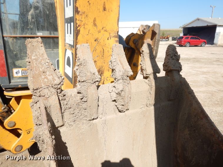 image for item DK3043 2001 John Deere 310SG  backhoe