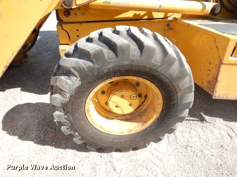 image for item DK3043 2001 John Deere 310SG  backhoe