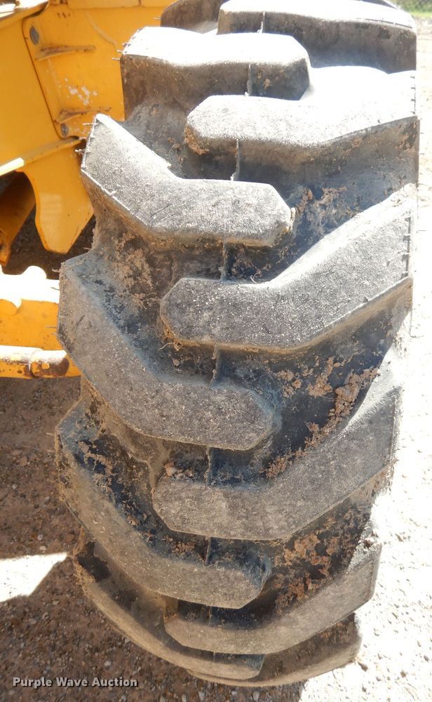 image for item DK3043 2001 John Deere 310SG  backhoe