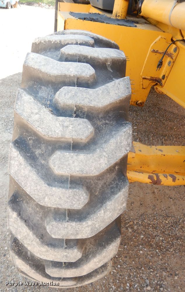 image for item DK3043 2001 John Deere 310SG  backhoe