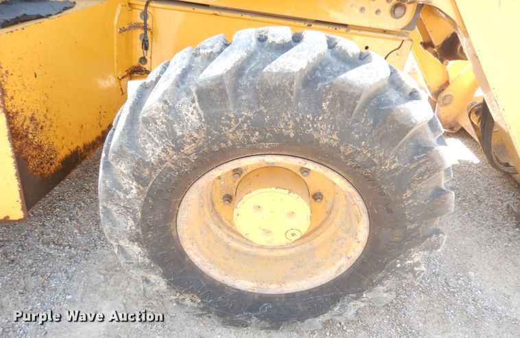 image for item DK3043 2001 John Deere 310SG  backhoe