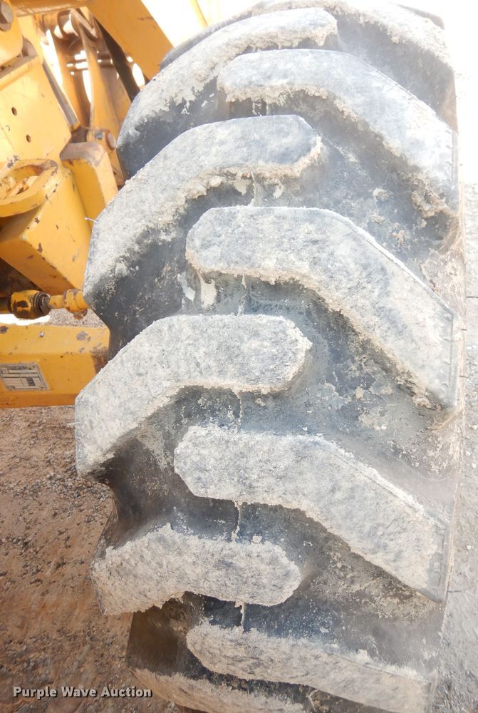 image for item DK3043 2001 John Deere 310SG  backhoe