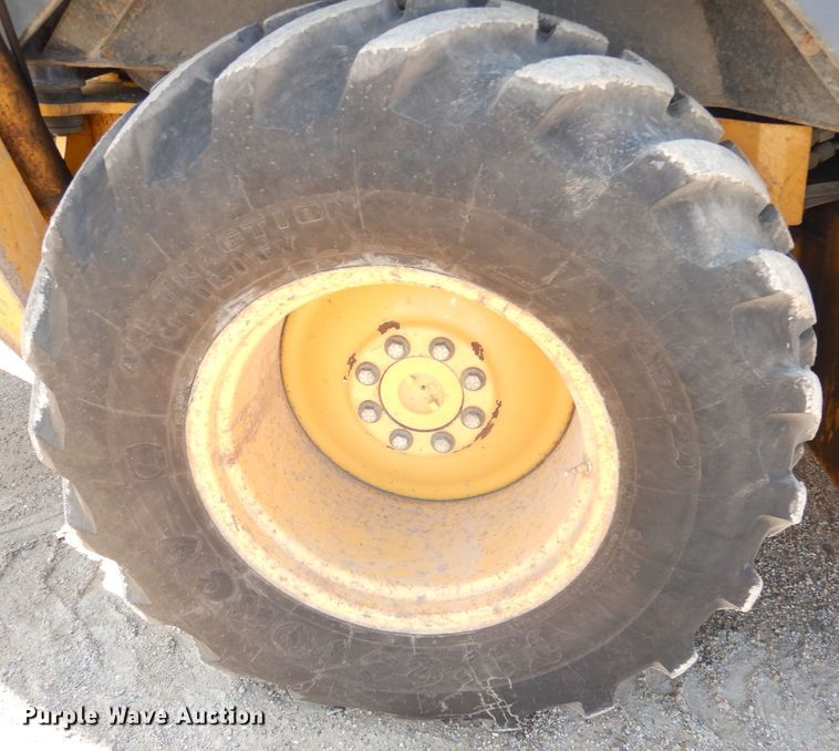 image for item DK3043 2001 John Deere 310SG  backhoe