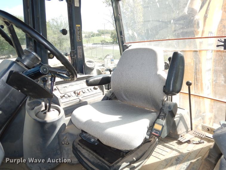 image for item DK3043 2001 John Deere 310SG  backhoe