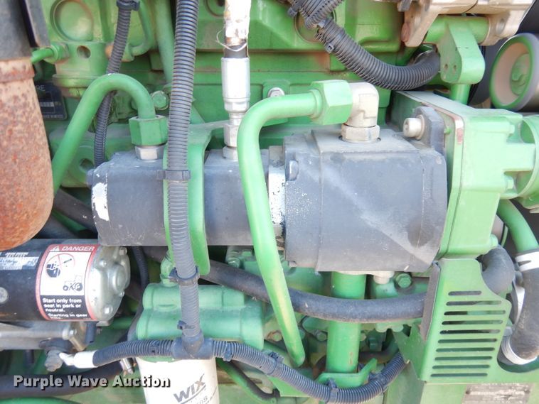 image for item KP9773 2009 John Deere 6140D  MFWD tractor