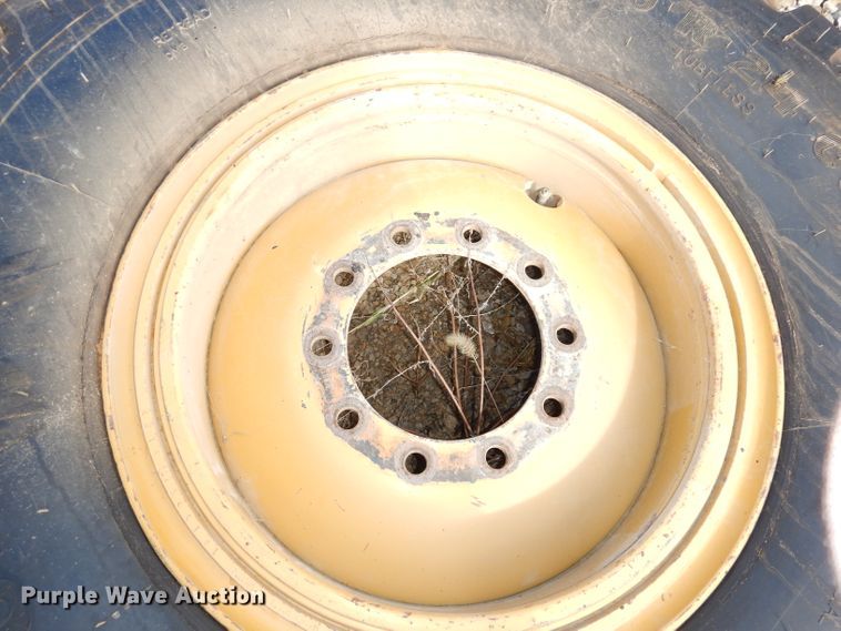 image for item KP9831 14.00R24 tire and wheel