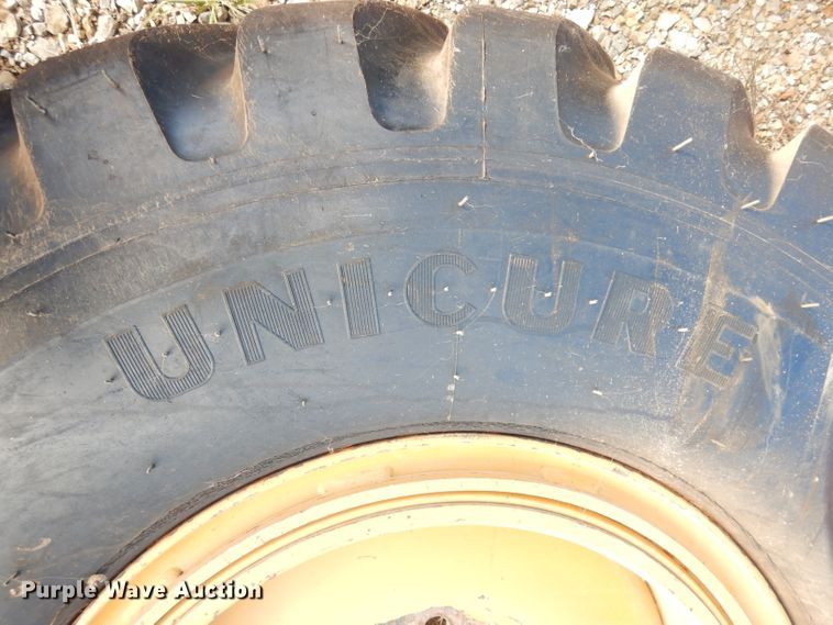 image for item KP9831 14.00R24 tire and wheel
