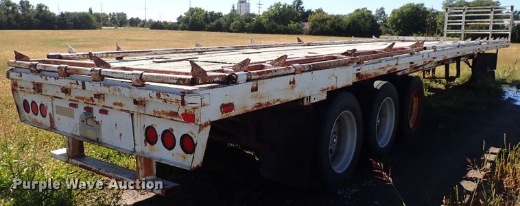 image for item DL7697 1977 Wilson  flatbed hay trailer
