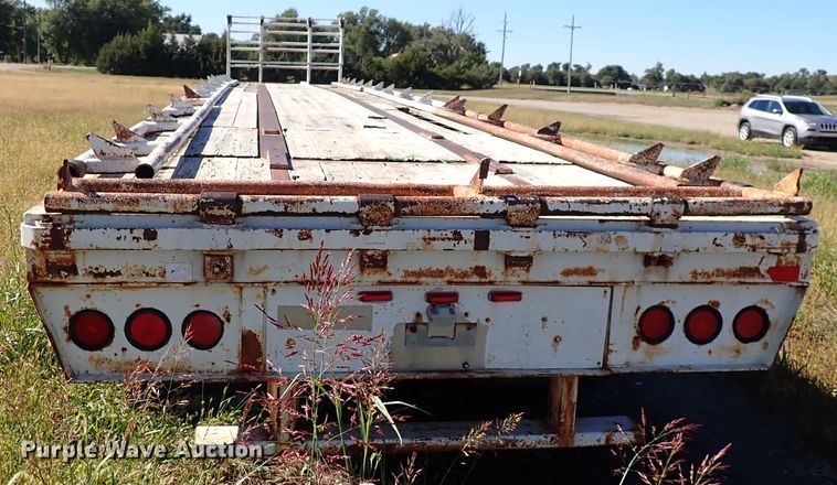 image for item DL7697 1977 Wilson  flatbed hay trailer