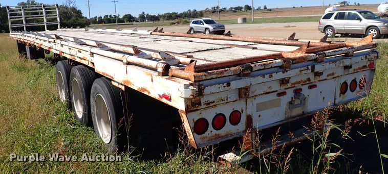 image for item DL7697 1977 Wilson  flatbed hay trailer