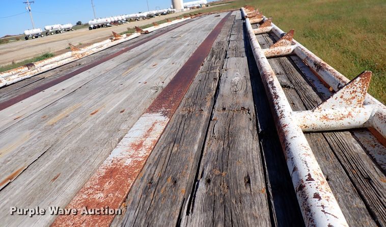 image for item DL7697 1977 Wilson  flatbed hay trailer