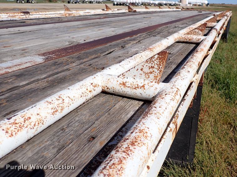 image for item DL7697 1977 Wilson  flatbed hay trailer