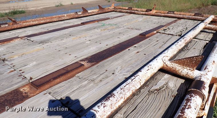 image for item DL7697 1977 Wilson  flatbed hay trailer