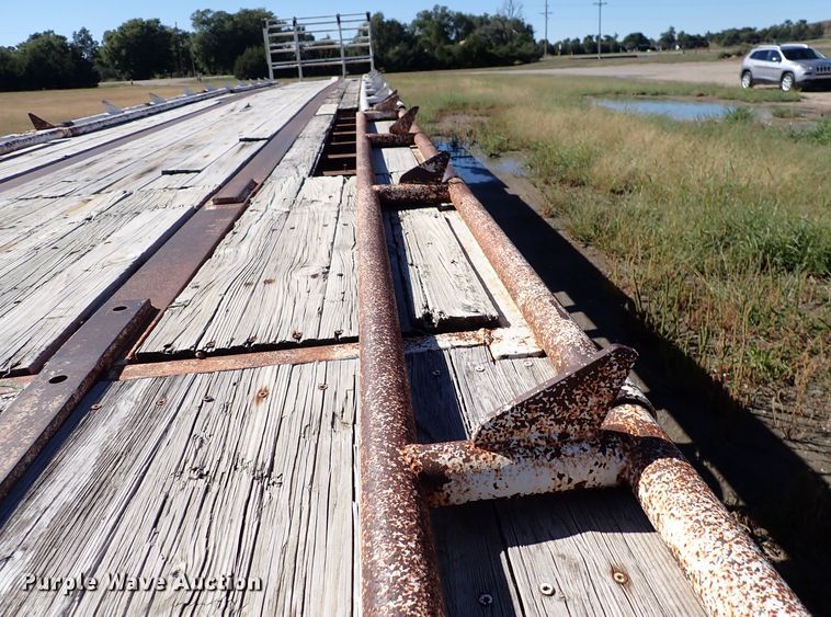 image for item DL7697 1977 Wilson  flatbed hay trailer