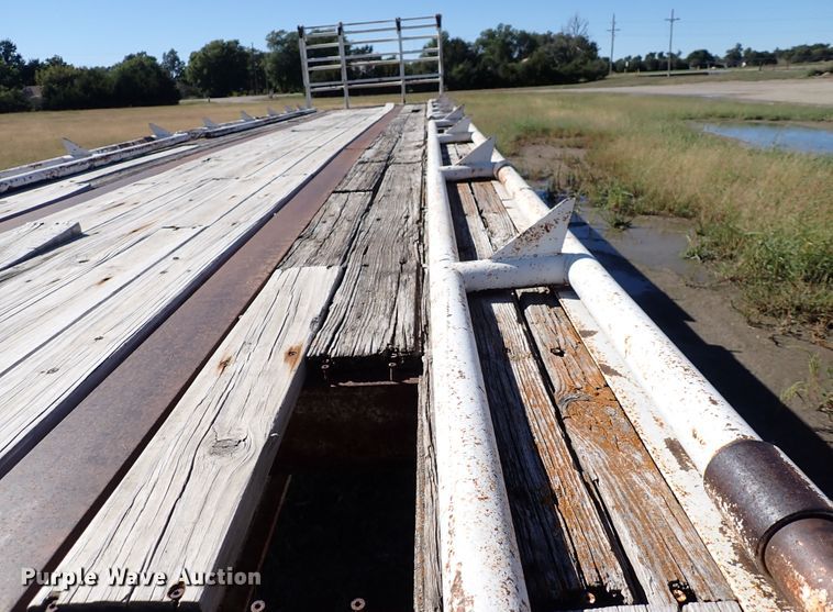 image for item DL7697 1977 Wilson  flatbed hay trailer
