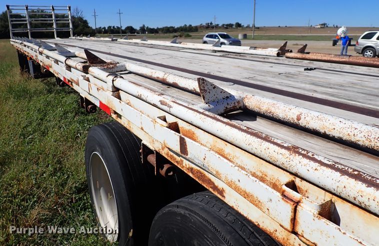 image for item DL7697 1977 Wilson  flatbed hay trailer