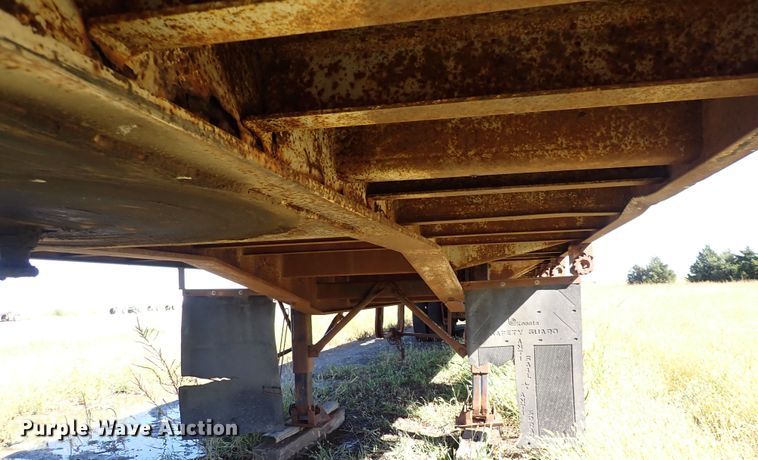 image for item DL7697 1977 Wilson  flatbed hay trailer