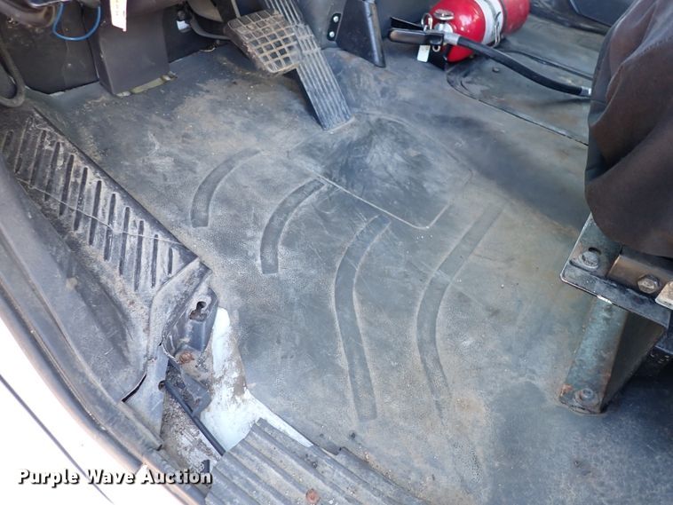 image for item DN2172 2006 Freightliner M106  rollback truck