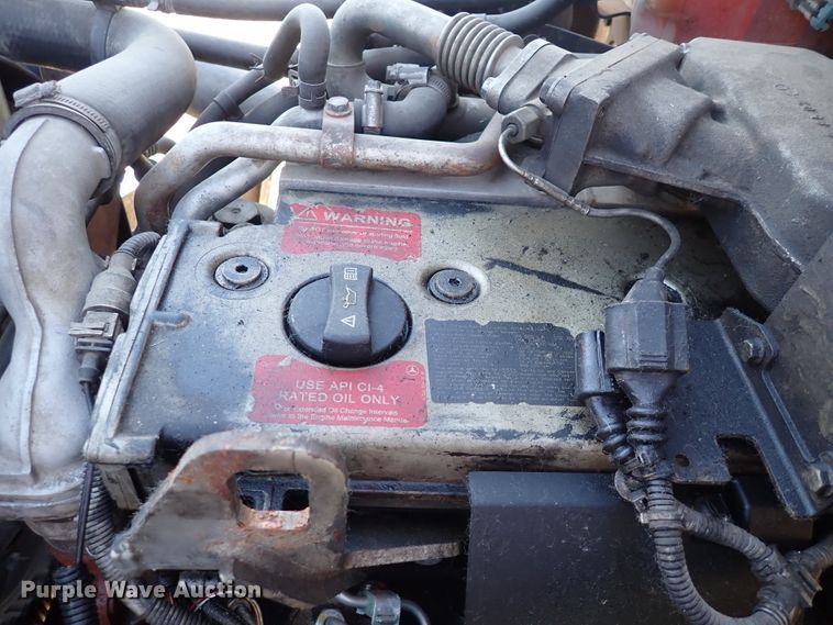 image for item DN2172 2006 Freightliner M106  rollback truck