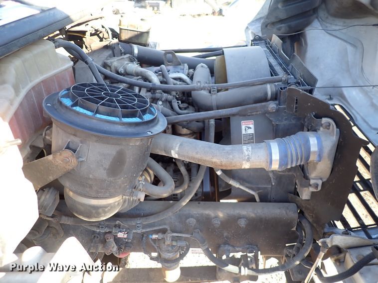 image for item DN2172 2006 Freightliner M106  rollback truck