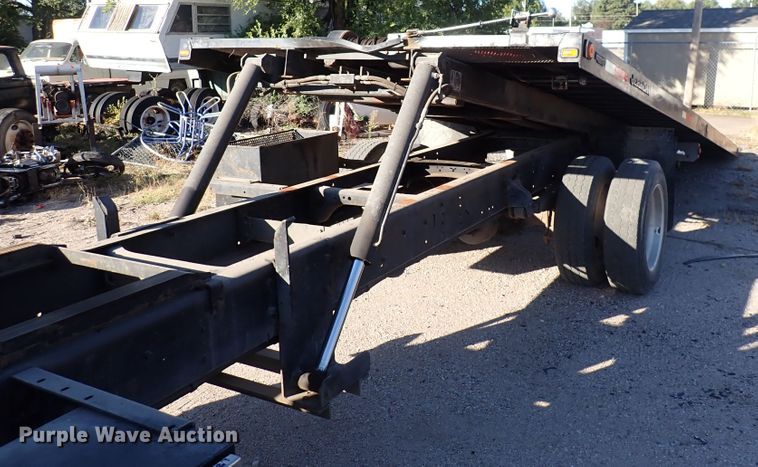 image for item DN2172 2006 Freightliner M106  rollback truck