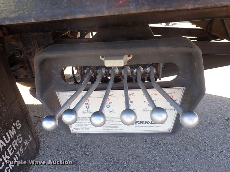 image for item DN2172 2006 Freightliner M106  rollback truck