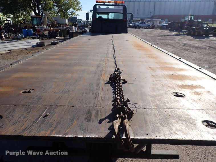 image for item DN2172 2006 Freightliner M106  rollback truck