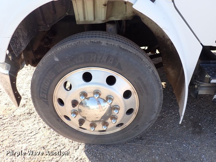 image for item DN2172 2006 Freightliner M106  rollback truck