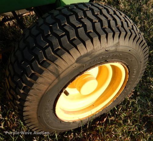 image for item IH9021 John Deere 325  lawn mower