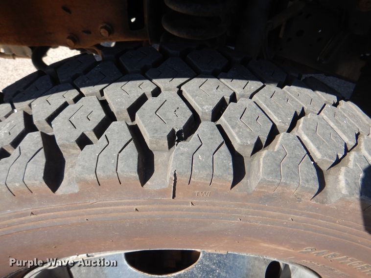 image for item DN6510 2005 Ford F450 Super Duty XLT  SuperCab flatbed truck