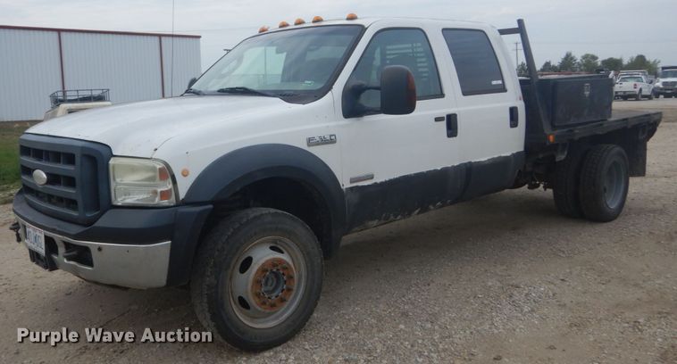 image for item JG9010 2005 Ford F550 Super Duty XLT  Crew Cab flatbed truck