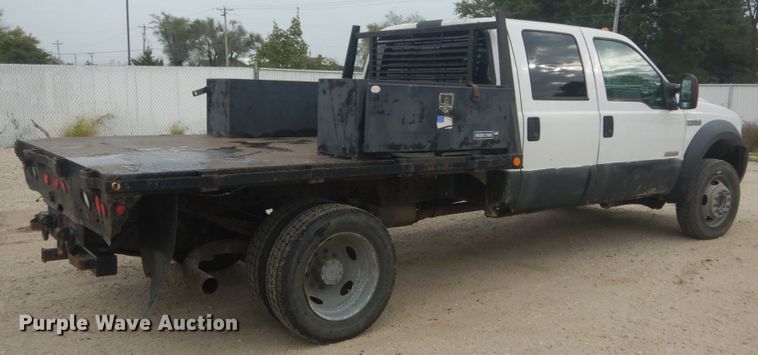 image for item JG9010 2005 Ford F550 Super Duty XLT  Crew Cab flatbed truck