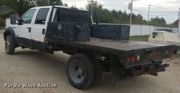 image for item JG9010 2005 Ford F550 Super Duty XLT  Crew Cab flatbed truck