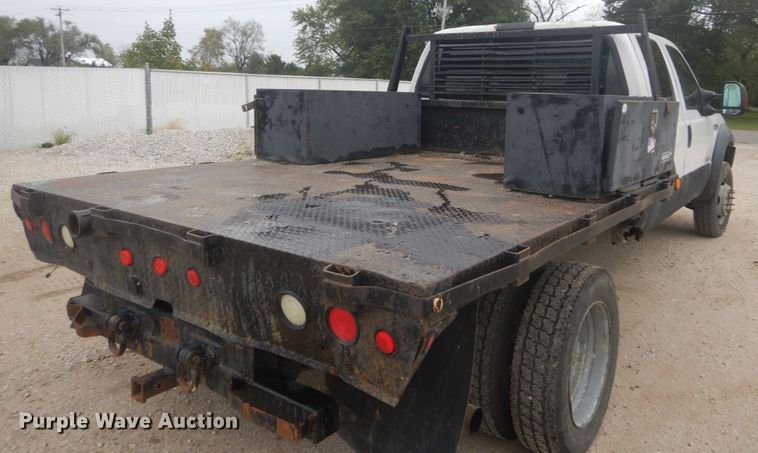 image for item JG9010 2005 Ford F550 Super Duty XLT  Crew Cab flatbed truck