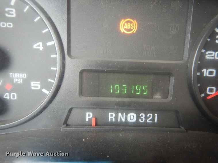 image for item JG9010 2005 Ford F550 Super Duty XLT  Crew Cab flatbed truck