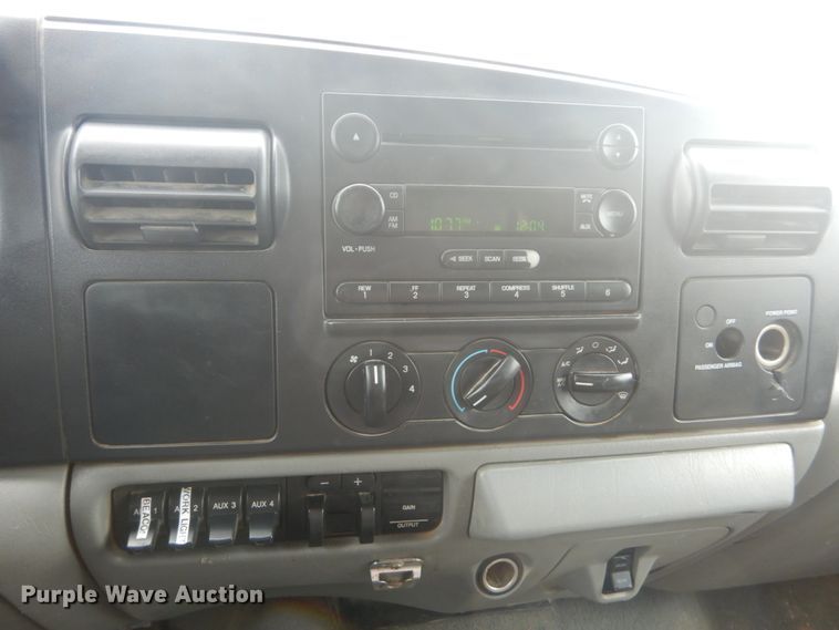 image for item JG9010 2005 Ford F550 Super Duty XLT  Crew Cab flatbed truck