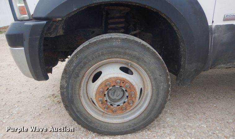 image for item JG9010 2005 Ford F550 Super Duty XLT  Crew Cab flatbed truck