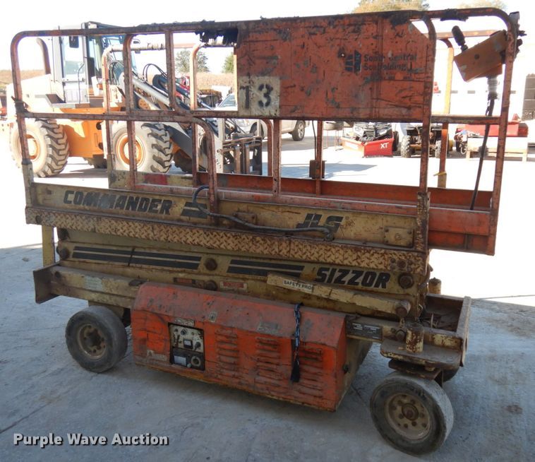 image for item JS9512 JLG CM-233  scissor lift