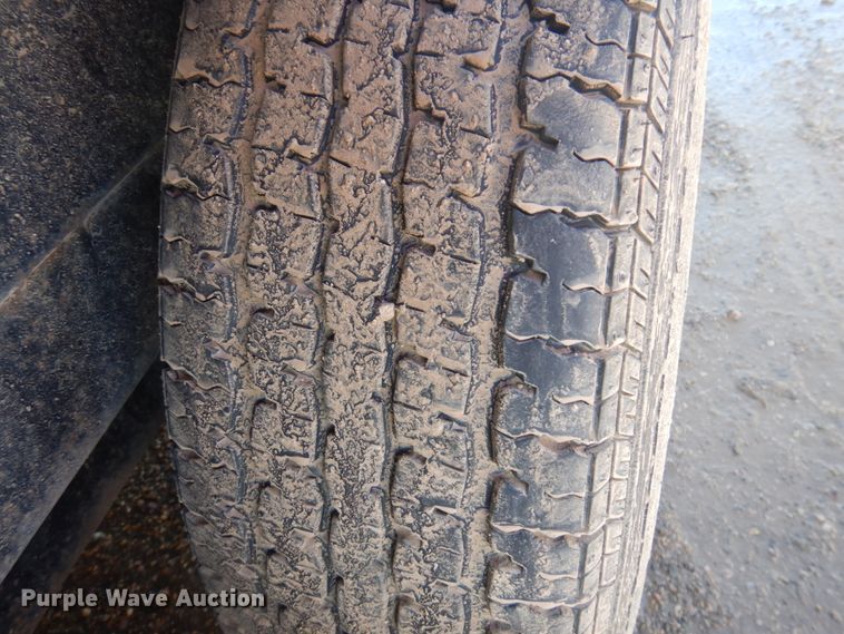 image for item JZ9799 2004 Load Rite  tilt deck equipment trailer