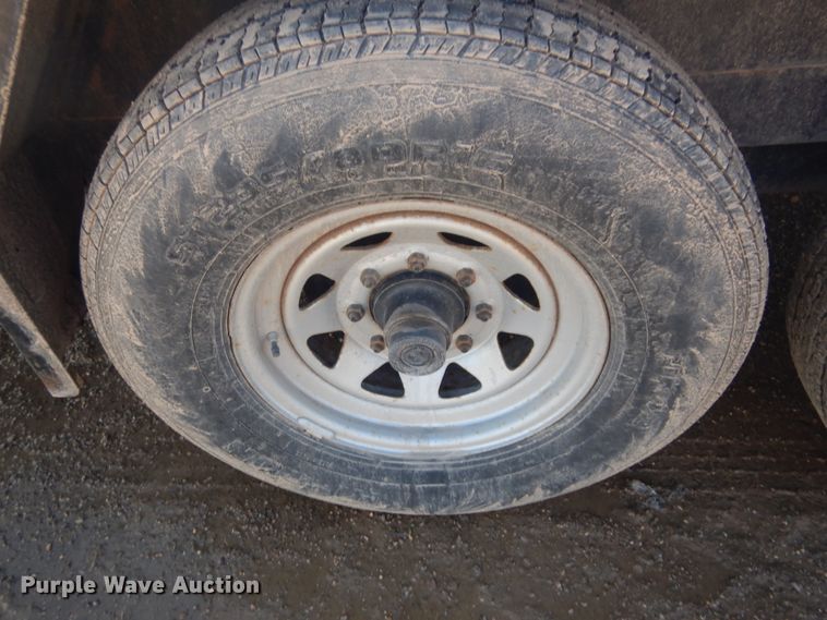 image for item JZ9799 2004 Load Rite  tilt deck equipment trailer