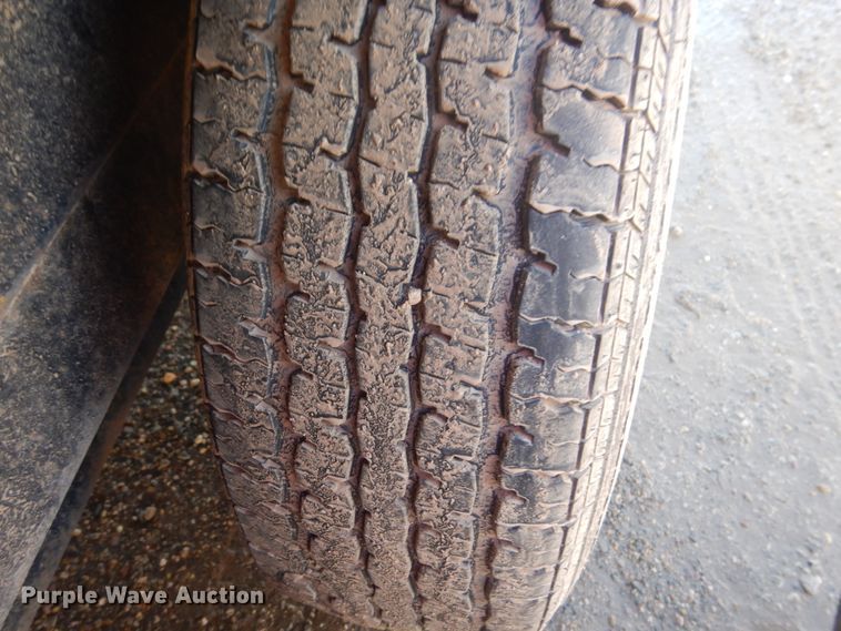 image for item JZ9799 2004 Load Rite  tilt deck equipment trailer