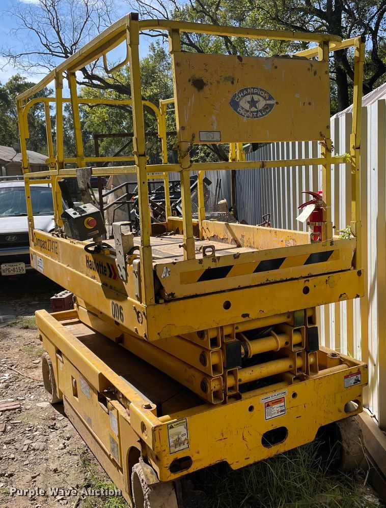 image for item DJ7425 2002 Haulotte Compact 2747E  scissor lift