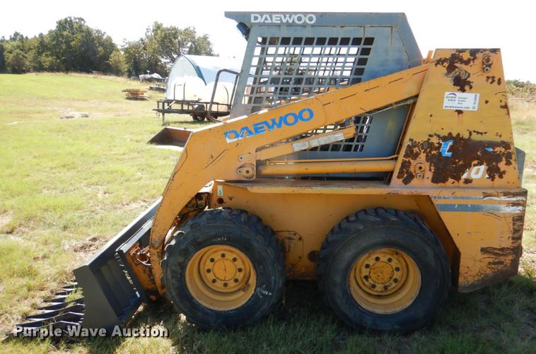 image for item DL0600 1997 Daewoo DSL801  skid steer loader