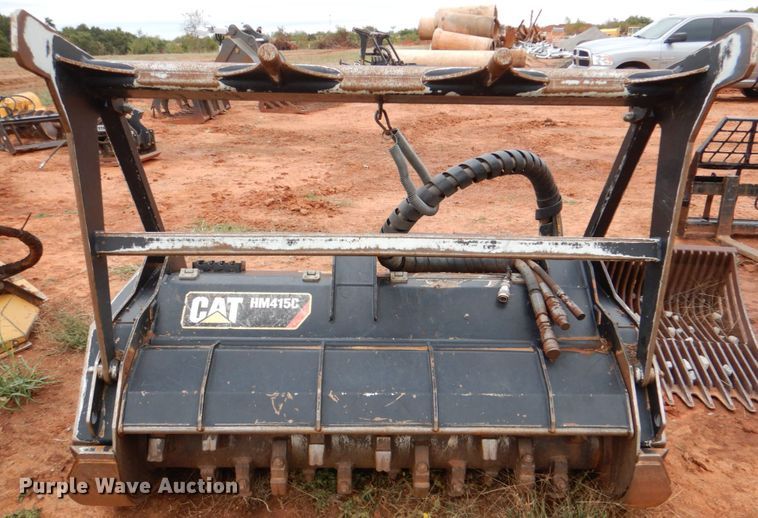 image for item DL0604 2019 Caterpillar HM415C  58" W skid steer mulcher