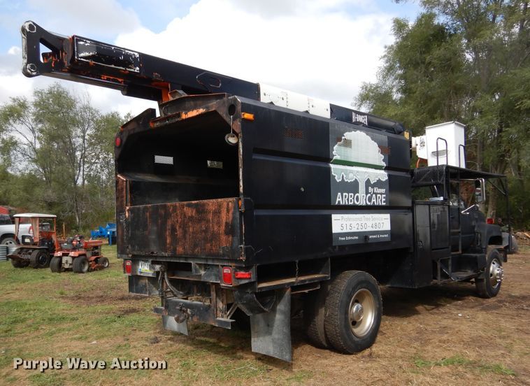 image for item DL6447 1999 GMC C7500  bucket truck