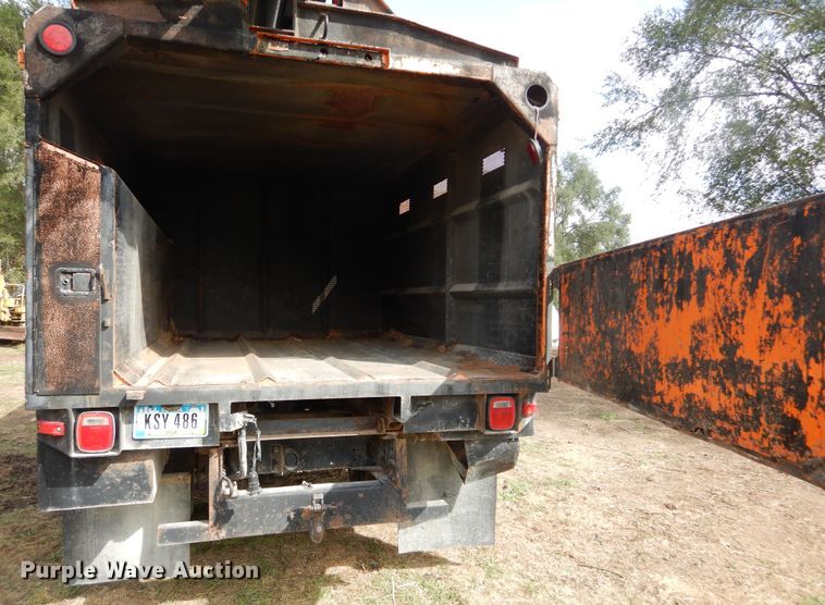 image for item DL6447 1999 GMC C7500  bucket truck