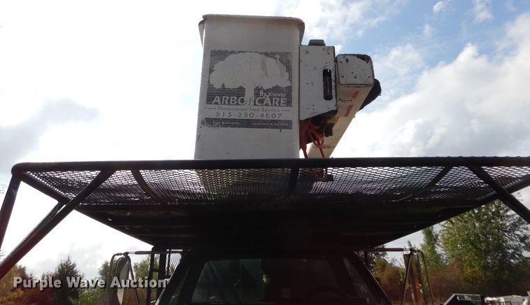 image for item DL6447 1999 GMC C7500  bucket truck